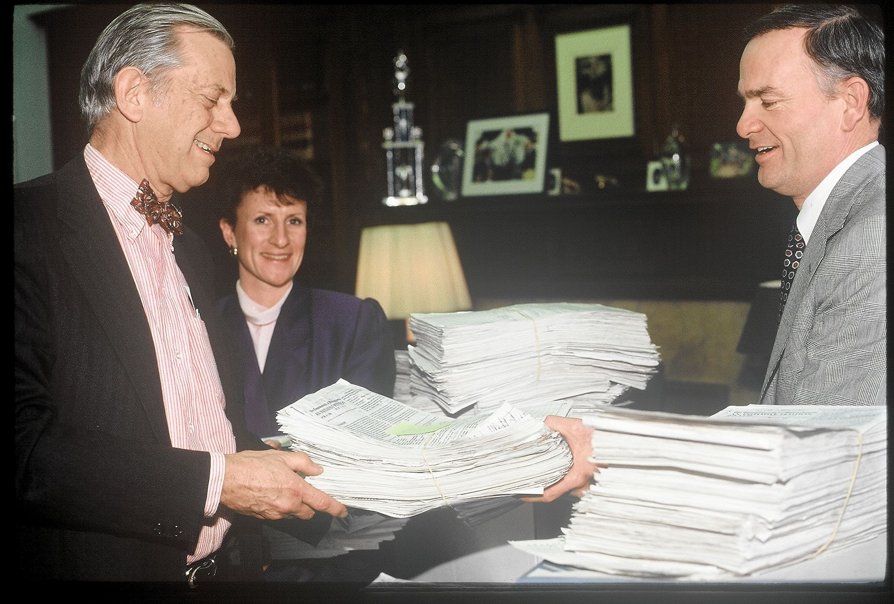 Dr. Blake Cady holds signature sheets for 1992's Question One ballot initiative. 